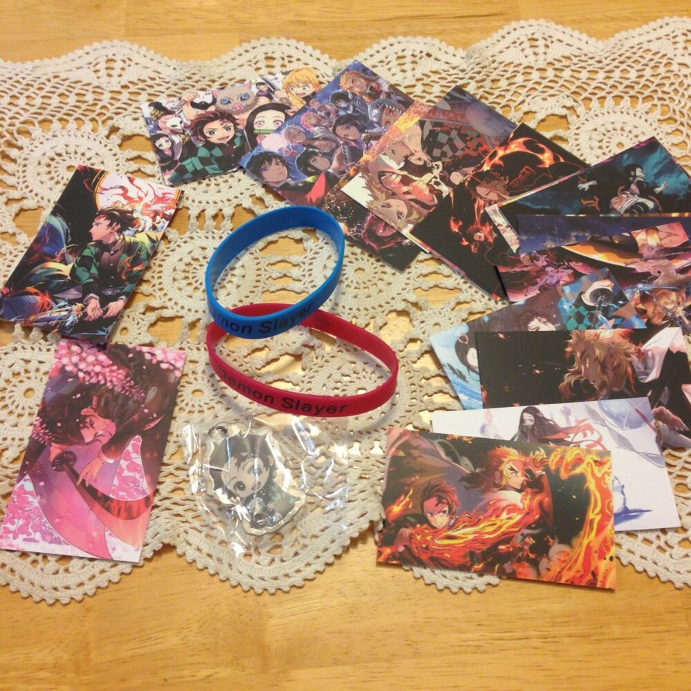 Anime cards, bracelets and keyring, all new Demon Slayer